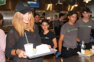 The highlight of Shake Shack Beirut's housewarming party: Our Fashion Editor Patricia Issa was given the official Shake Shack cap, and allowed to pose as a waitress. Elie Wehbe/BelleBeirut