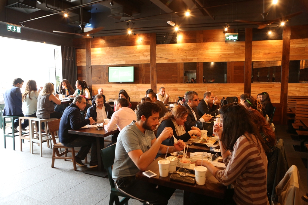 Members of the media enjoying a meal at the new Shake Shack ABC Achrafieh. Photo via Patchworkevents 