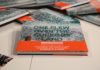 Elio Sassine signs his book “One Flew Over the Cuckoo’s Land”